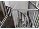 Exterior view of spiral staircase with white railing at 9720 Indian Key Trl # 117, Seminole, FL 33776