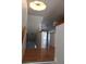 View of carpeted stairs leading to the living room at 9720 Indian Key Trl # 117, Seminole, FL 33776