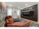 Spacious recreation room with a built-in entertainment center and comfortable seating at 851 Brightwaters Ne Blvd, St Petersburg, FL 33704