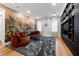 Relaxing recreation room featuring a built-in entertainment center and artistic wall mural at 851 Brightwaters Ne Blvd, St Petersburg, FL 33704