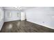 Open living room with vinyl flooring and lots of natural light at 1320 Woodbine St, Clearwater, FL 33755