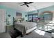 Bright bedroom with a queen-size bed and dresser at 14130 Rosemary Ln # 3309, Largo, FL 33774