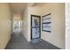 Building entrance with security door at 14130 Rosemary Ln # 3309, Largo, FL 33774