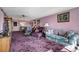 Spacious living area showcasing open layout, seamless flow to dining, and elegant decor at 14130 Rosemary Ln # 3309, Largo, FL 33774