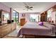 Main bedroom with king bed and lots of light at 14130 Rosemary Ln # 3309, Largo, FL 33774