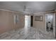 Spacious bedroom with marble floors and an ensuite bathroom at 16003 2Nd E St, Redington Beach, FL 33708