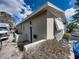 Side view of house with window awnings at 16003 2Nd E St, Redington Beach, FL 33708