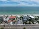 Aerial view of beachfront property with ocean views and nearby buildings at 16003 2Nd E St, Redington Beach, FL 33708