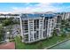 High-rise condo building with water views at 9415 Blind Pass Rd # 1103, St Pete Beach, FL 33706
