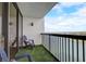 Private balcony with water views and artificial turf at 9415 Blind Pass Rd # 1103, St Pete Beach, FL 33706