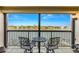 Enjoy water views from this balcony, featuring a bistro set at 9495 Blind Pass Rd # 307, St Pete Beach, FL 33706
