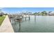 Boat slips and calm water provide a relaxing waterfront view at 12405 3Rd E St # 304, Treasure Island, FL 33706