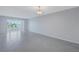 Spacious living room with tile floors and water views at 12405 3Rd E St # 304, Treasure Island, FL 33706