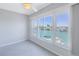 Bright bedroom with large windows and water views at 12405 3Rd E St # 304, Treasure Island, FL 33706