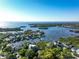 Waterfront community with numerous homes and lush greenery at 761 Soundview Dr, Palm Harbor, FL 34683
