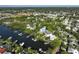 Wide aerial showing home and neighborhood, located on the water at 761 Soundview Dr, Palm Harbor, FL 34683