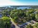 Aerial view of vacant lot near the water, surrounded by trees at 761 Soundview Dr, Palm Harbor, FL 34683