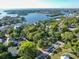 Aerial view showcasing a waterfront lot surrounded by lush vegetation at 761 Soundview Dr, Palm Harbor, FL 34683