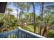 Peaceful backyard with lush landscaping and gazebo at 761 Soundview Dr, Palm Harbor, FL 34683