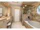 Elegant bathroom with granite countertops and a glass shower at 761 Soundview Dr, Palm Harbor, FL 34683
