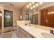 Updated bathroom with double vanity and lots of natural light at 761 Soundview Dr, Palm Harbor, FL 34683
