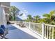 Extended deck features comfortable seating, a bench, and scenic views at 761 Soundview Dr, Palm Harbor, FL 34683