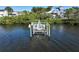 Private dock with boat lift, providing convenient water access at 761 Soundview Dr, Palm Harbor, FL 34683