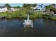 Private dock with lift for easy boat access; calm waters at 761 Soundview Dr, Palm Harbor, FL 34683