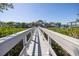 Private dock with walkway leading to the water at 761 Soundview Dr, Palm Harbor, FL 34683