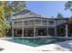 Two-story home with pool, expansive deck and outdoor kitchen at 761 Soundview Dr, Palm Harbor, FL 34683