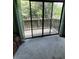 Private balcony overlooking wooded area at 2101 Sunset Point Rd # 1001, Clearwater, FL 33765