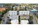 Aerial view of coastal buildings and ocean at 11605 1St E St # 6, Treasure Island, FL 33706