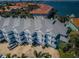 Stunning waterfront townhome community featuring meticulously landscaped grounds and serene water views at 213 46Th Ave, St Pete Beach, FL 33706
