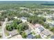 Sprawling neighborhood, a blend of established homes and new construction surrounded by trees at 4780 Majestic Hills Loop, Brooksville, FL 34601