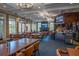Community clubhouse interior with bar, fireplace and seating area at 4780 Majestic Hills Loop, Brooksville, FL 34601