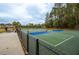 Well-maintained pickleball courts with seating area at 4780 Majestic Hills Loop, Brooksville, FL 34601