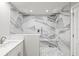 Bathroom featuring double shower heads, rain shower, and modern tile at 170 98Th N Ave, St Petersburg, FL 33702