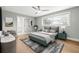 Comfortable bedroom with large window, neutral colors, and ensuite bathroom access for a peaceful retreat at 170 98Th N Ave, St Petersburg, FL 33702