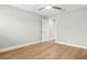 Bright bedroom with hardwood floors, ceiling fan, and neutral paint at 170 98Th N Ave, St Petersburg, FL 33702