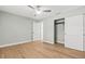 Bright bedroom with ceiling fan, closet, and modern finishes at 170 98Th N Ave, St Petersburg, FL 33702