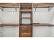 Walk-in closet with custom shelving and drawers at 170 98Th N Ave, St Petersburg, FL 33702
