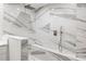 Spacious shower with marble tile and dual shower heads at 170 98Th N Ave, St Petersburg, FL 33702