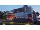 Contemporary home boasting clean lines, multiple levels, and lush, well-maintained landscaping at 1761 Oceanview Dr, St Petersburg, FL 33715