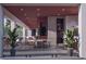 Outdoor dining area featuring a long table, an open wall design, and natural light at 1761 Oceanview Dr, St Petersburg, FL 33715