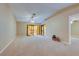 Spacious living room with sliding glass doors leading to a balcony at 2020 Lakeview Dr # 203, Clearwater, FL 33763