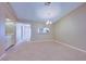 Dining area with wet bar and view into kitchen at 2020 Lakeview Dr # 203, Clearwater, FL 33763