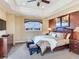 Main bedroom with king bed, and access to a private balcony at 17371 Kennedy Dr, North Redington Beach, FL 33708