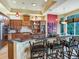 Modern kitchen, granite counters, breakfast bar and wine cooler at 17371 Kennedy Dr, North Redington Beach, FL 33708