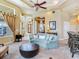 Open living room featuring a curved sofa and hardwood floors at 17371 Kennedy Dr, North Redington Beach, FL 33708