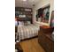 Bedroom showcasing vinyl records, a vintage record player, and a cozy bed at 6015 19Th N St # 308, St Petersburg, FL 33714